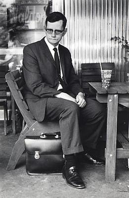 Man at an outdoor cafe