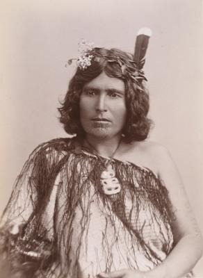 Woman Wearing Heitiki, Clematis and Huia Feathers