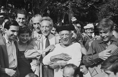 After the bullfight - Cocteau, Picasso in a Matador's hat, and guitar player