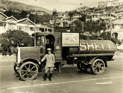 (Man in uniform and cap with a Shell petrol tanker, Wellington)