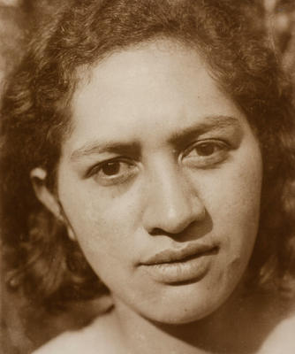 (Head shot of young Maori woman)