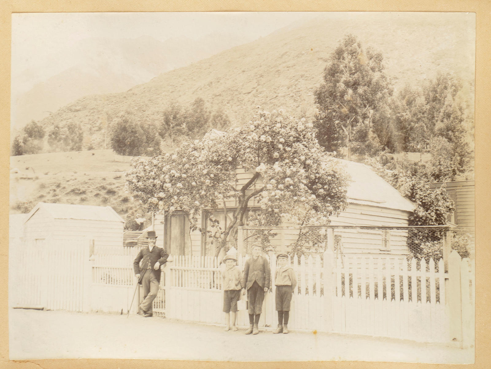 (Man with three children)