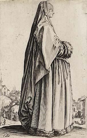 La dame coiffée d'un grand voile et a la robe bordee de fourrures