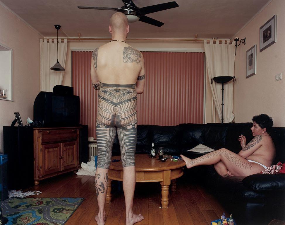 21.5.2002. Vaalkenswaard, Eindhoven, The Netherlands. René and Carina Persoons watching TV. Tufuga ta Tatau, Su'a Sulu'ape Paulo II and Su'a Sulu'ape M.T.