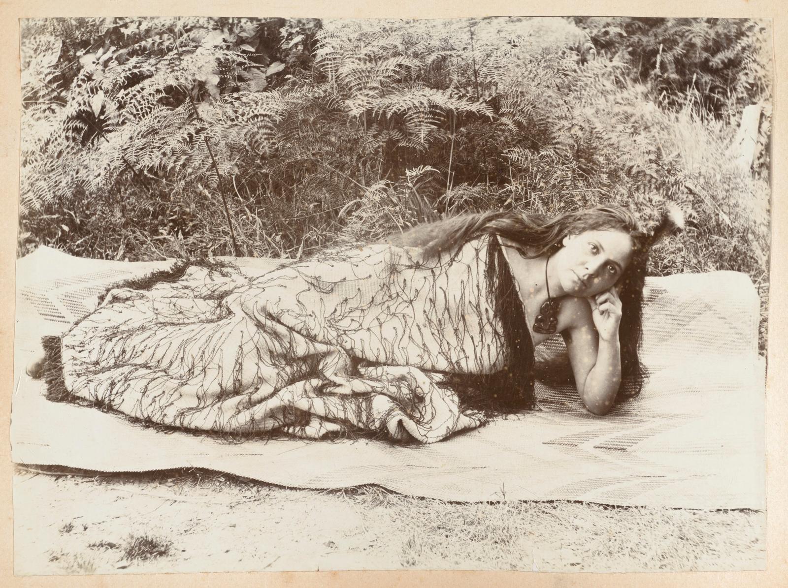 Maori woman wearing korowai cloak