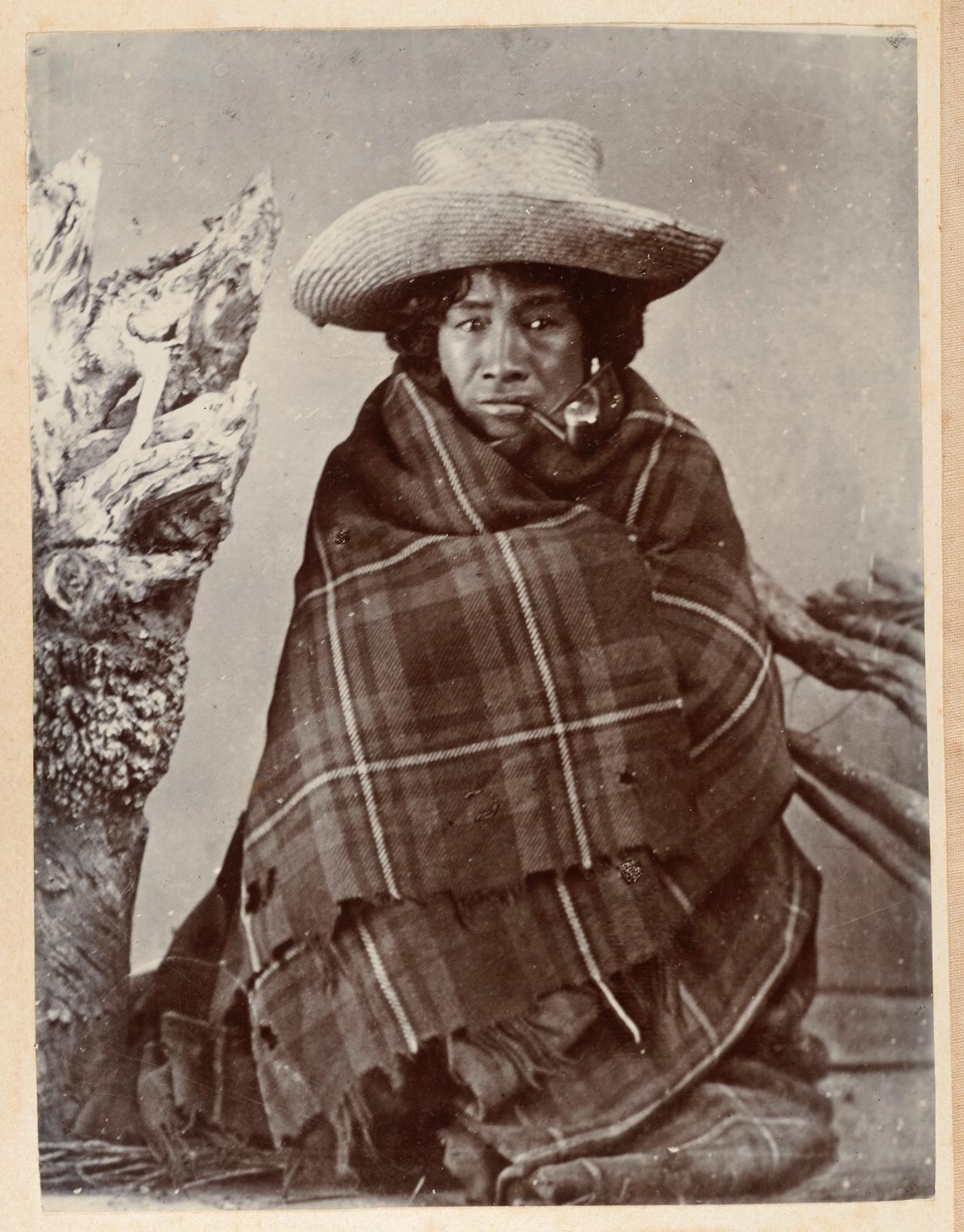 Maori woman wearing blanket