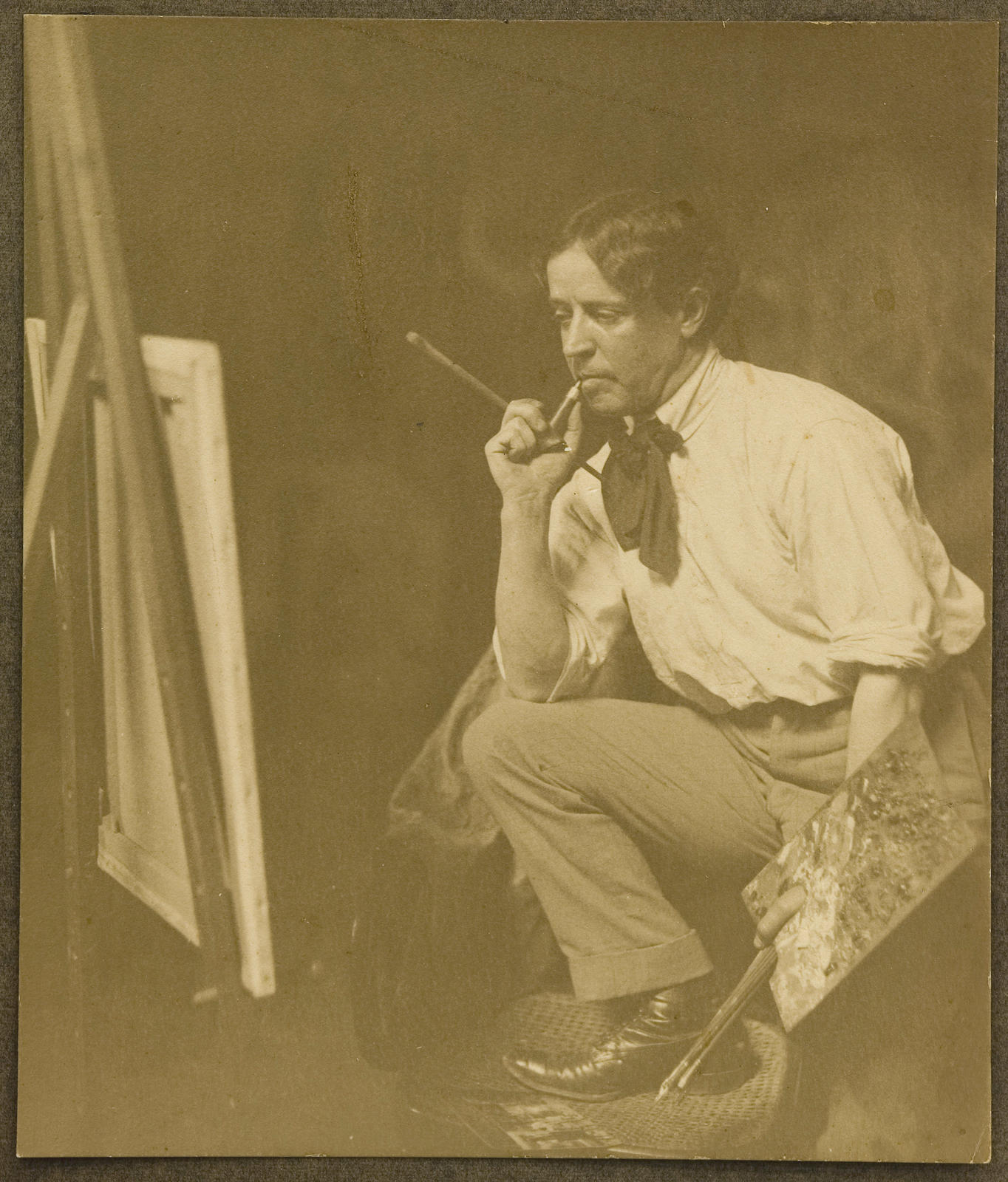 C.F. Goldie at his easel