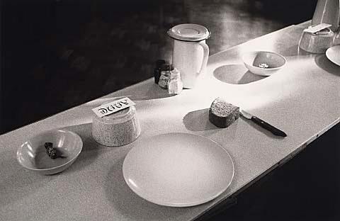 A place setting in the refectory. The rule of the Great Silence is observed here. The purpose of silence in the monastery is to develop the spirit or atmosphere of recollection necessary for deep prayer