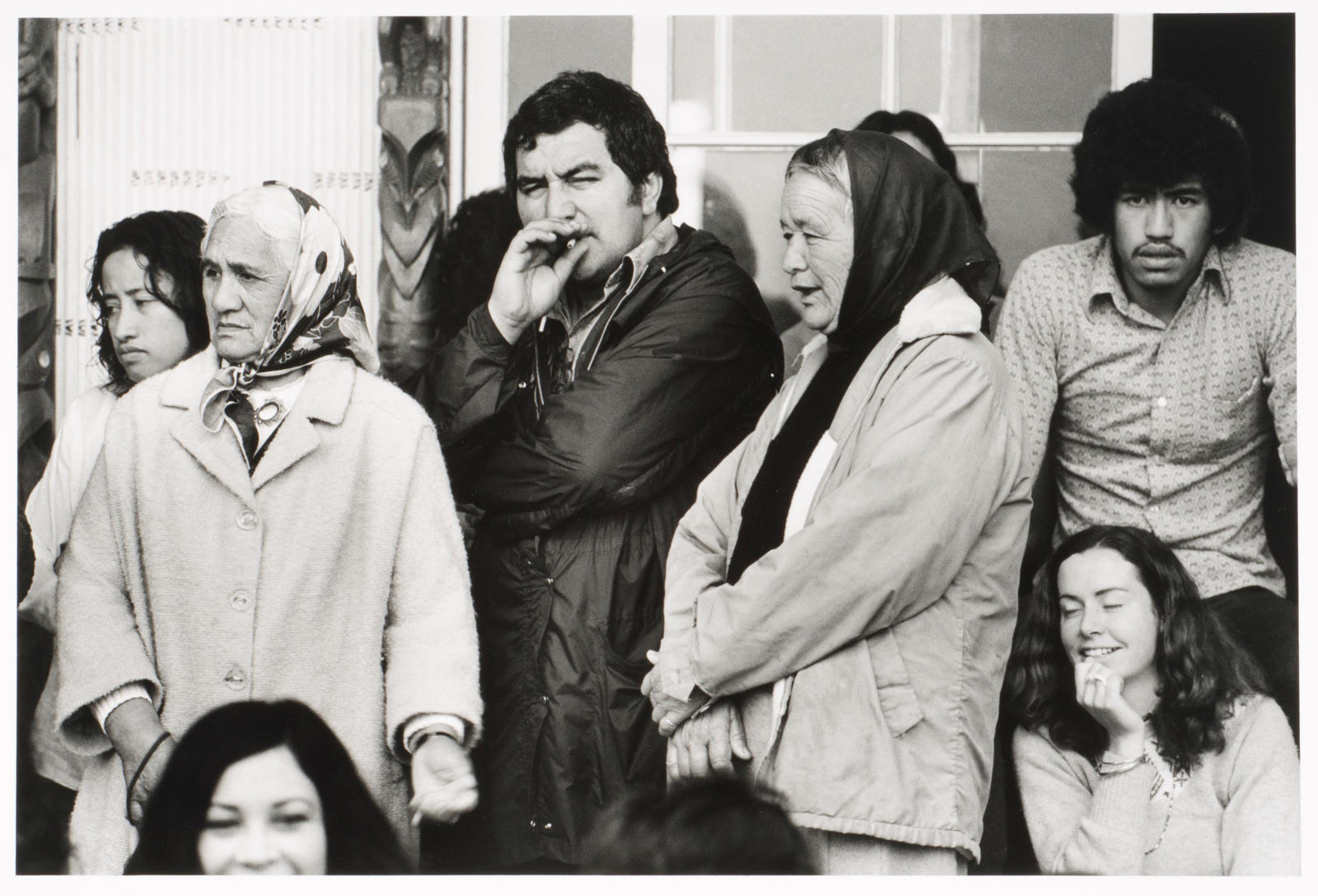 Porch Tukaki wharenui, Te Kaha-nui-a-tiki marae, Te Kaha. Selwyn Muru with local kuia. June 1973