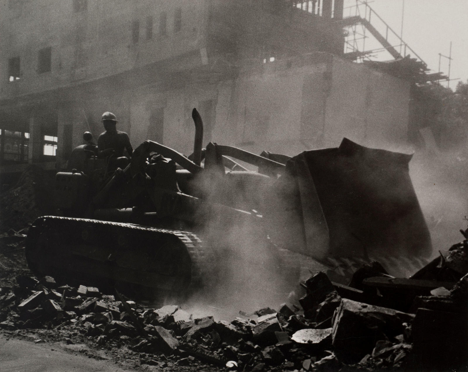 Man and monster (Man and bulldozer)