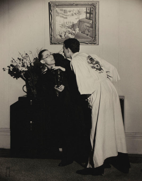 (Encounter between two men, one in white robe)
