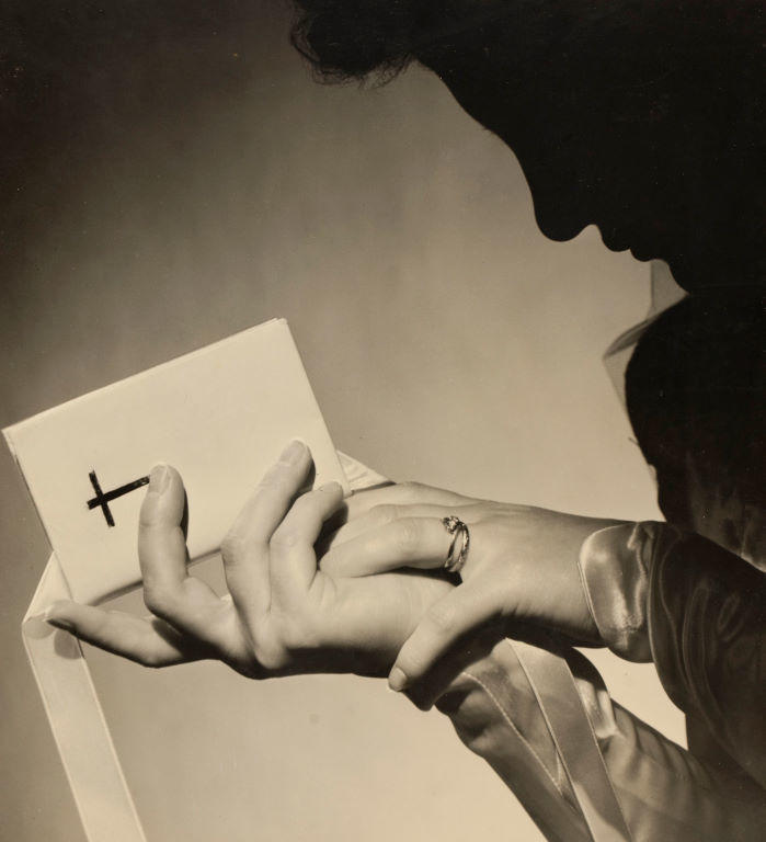 (Married woman silhouetted over devotional bible)