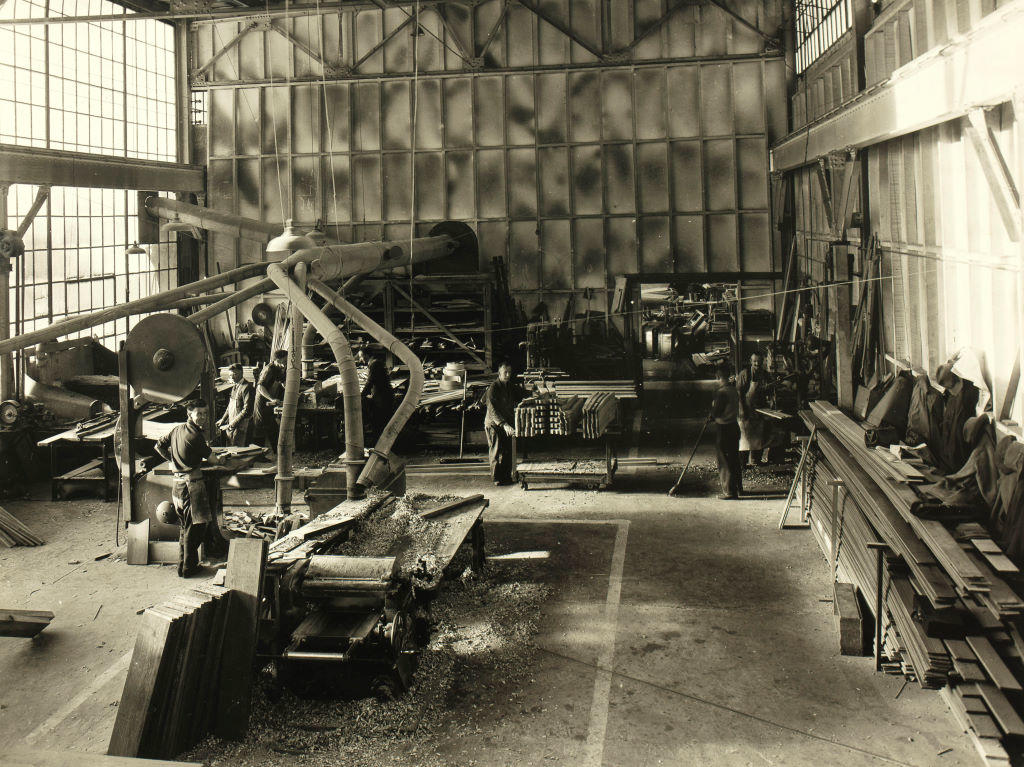 (Men in factory)