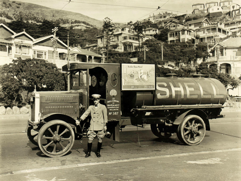 (Man in uniform and cap with a Shell petrol tanker, Wellington)