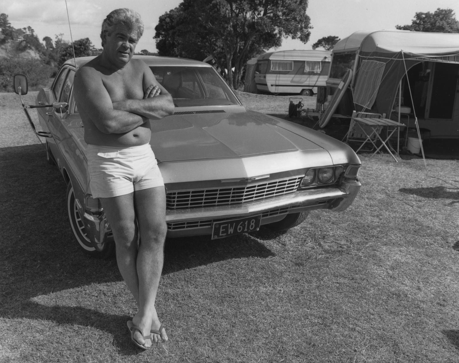The Hibiscus Coast Project, Campers and Lifesavers: Man leaning against Chevrolet car