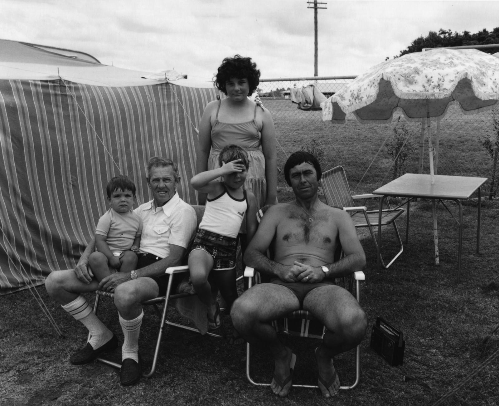 The Hibiscus Coast Project, Campers and Lifesavers: Family group with small sun umbrella
