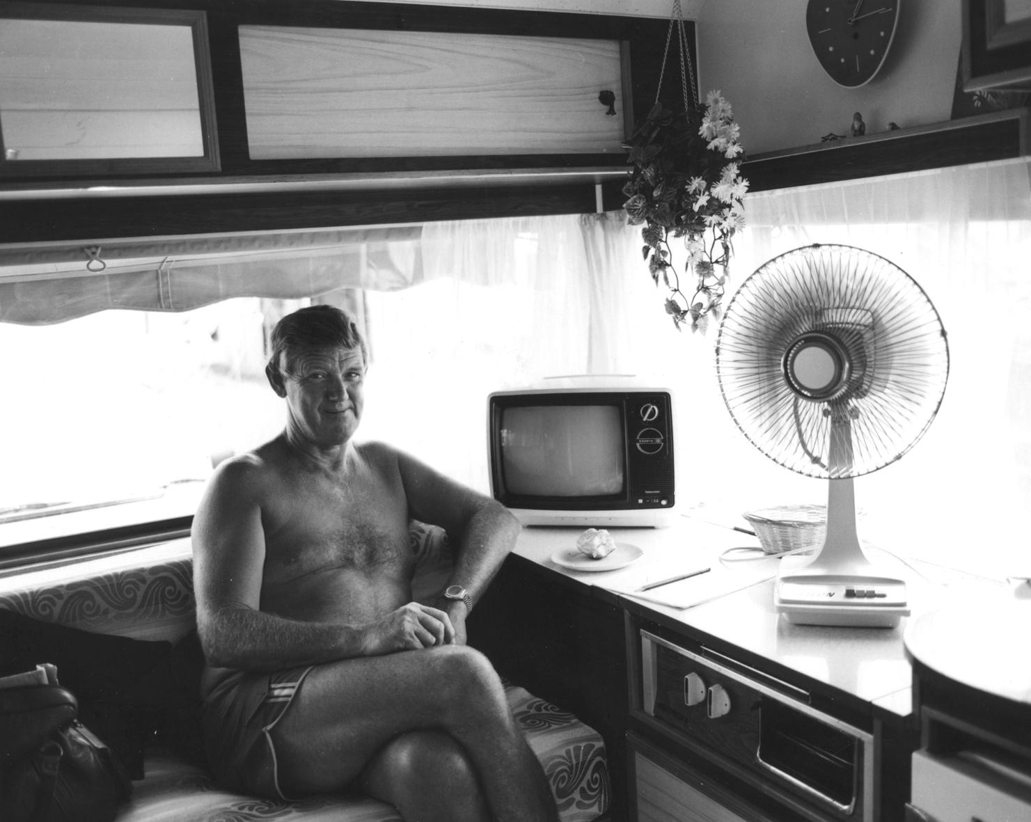 The Hibiscus Coast Project, Campers and Lifesavers: Man in caravan with TV and electric fan