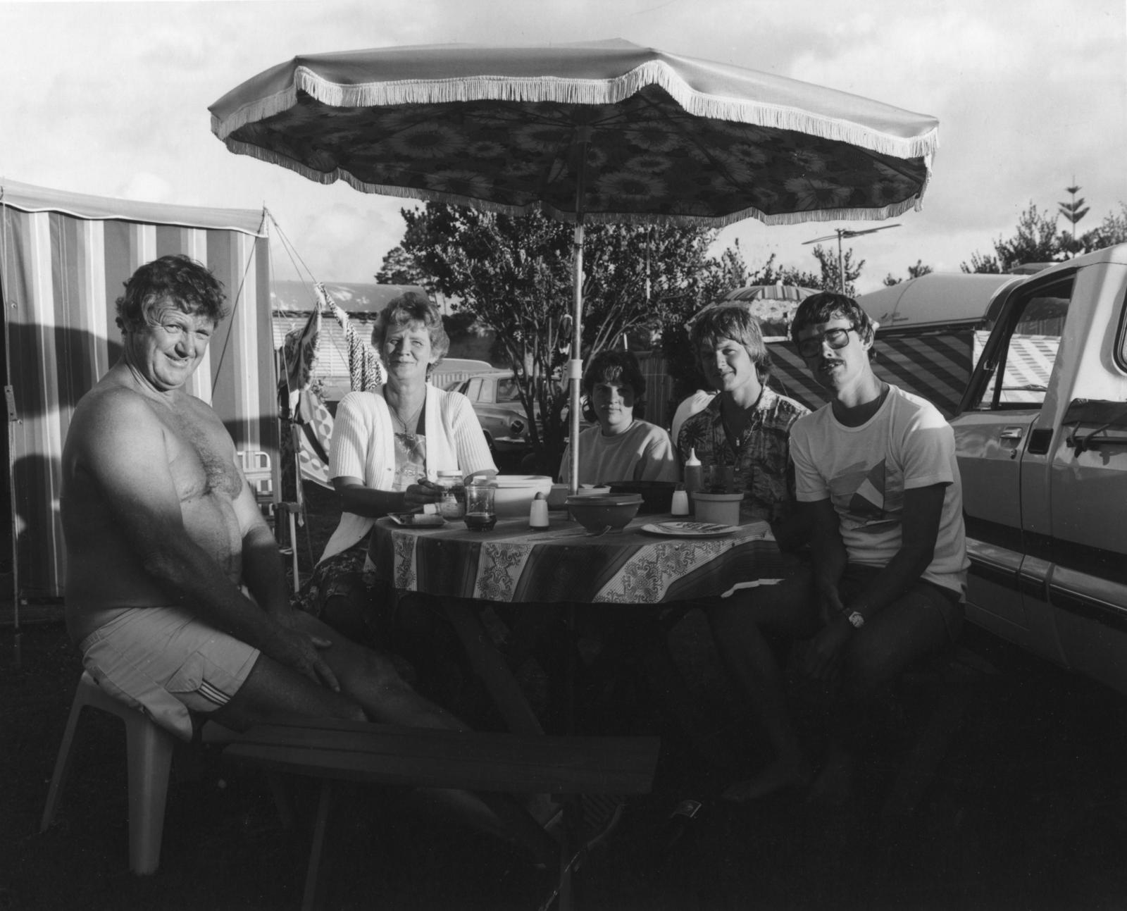 The Hibiscus Coast Project, Campers and Lifesavers: Family group with large sun umbrella