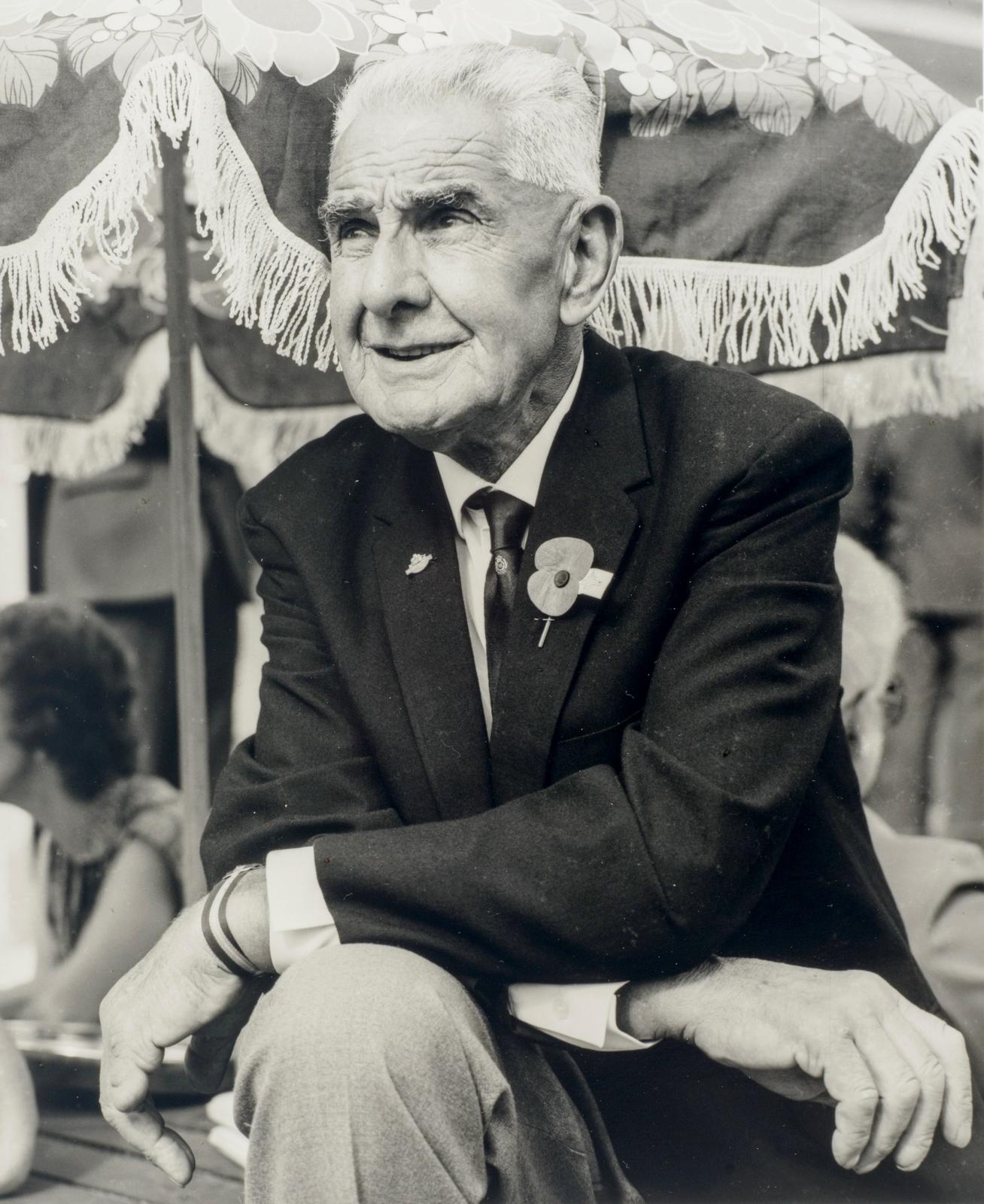 The Hibiscus Coast Project, ANZAC Day Veterans: Veteran With Arms Folded Across Knee
