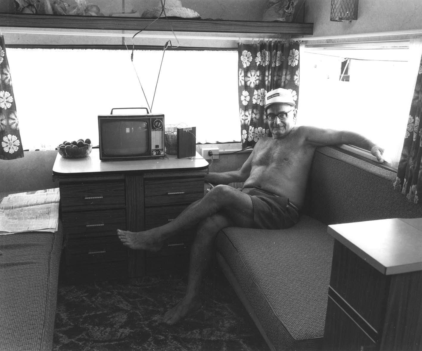 The Hibiscus Coast Project, Campers and Lifesavers: Man in caravan with TV
