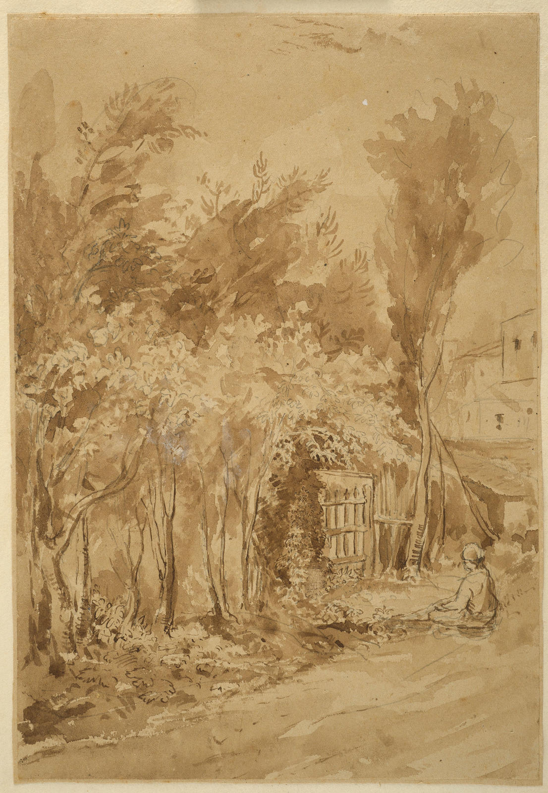 Child sitting near gate